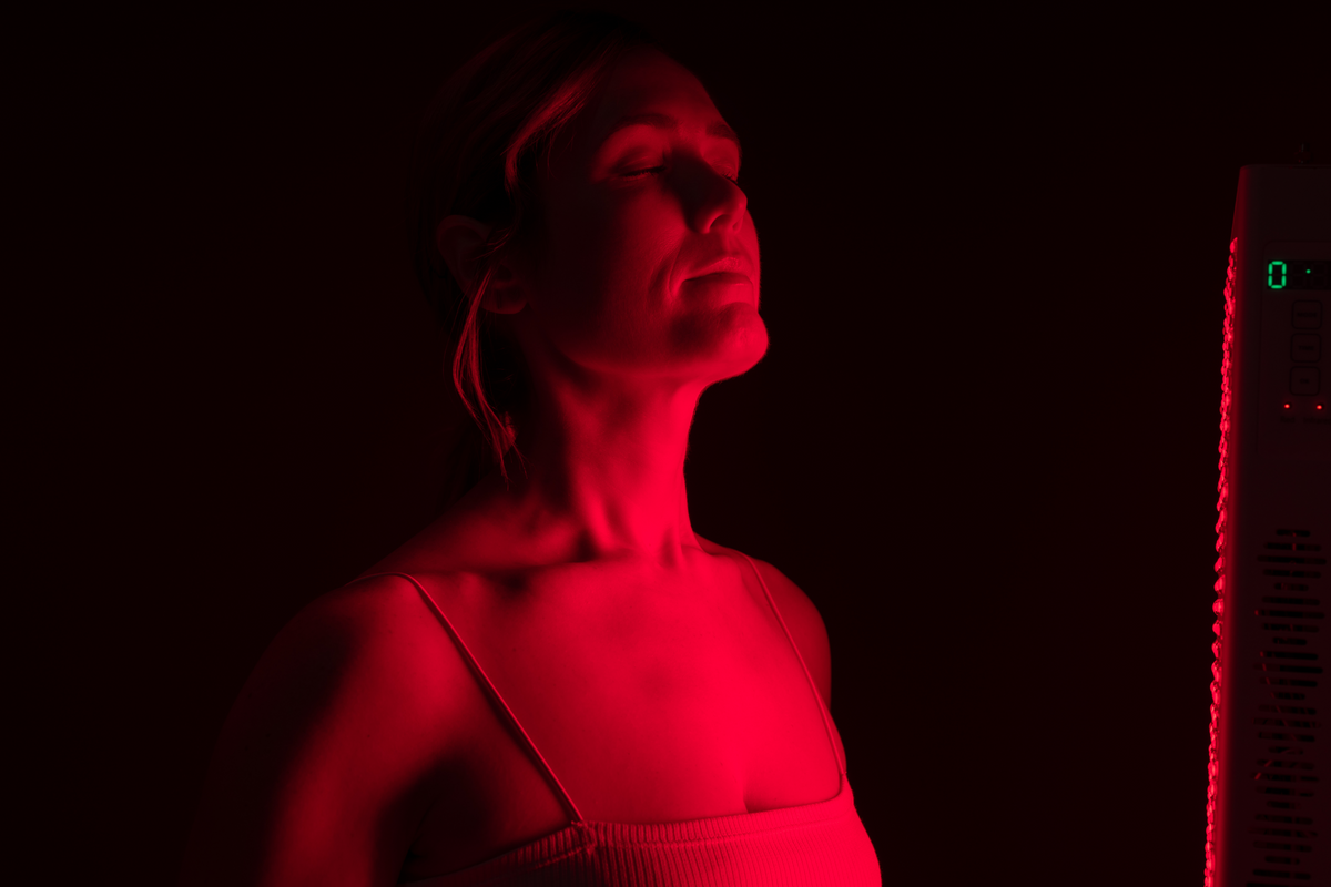 Woman using infrared Light Therapy