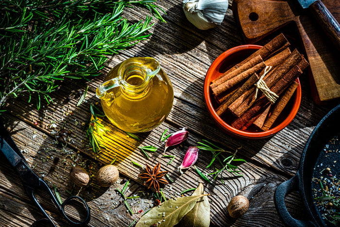 Examples of natural flavors, including cinnamon sticks, flowers, herbs, and oils.