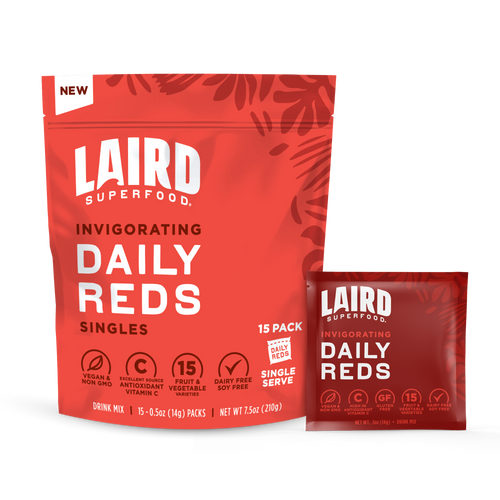 large daily reds pouch next to single serving packet showing the 15 pack of single serve daily reds