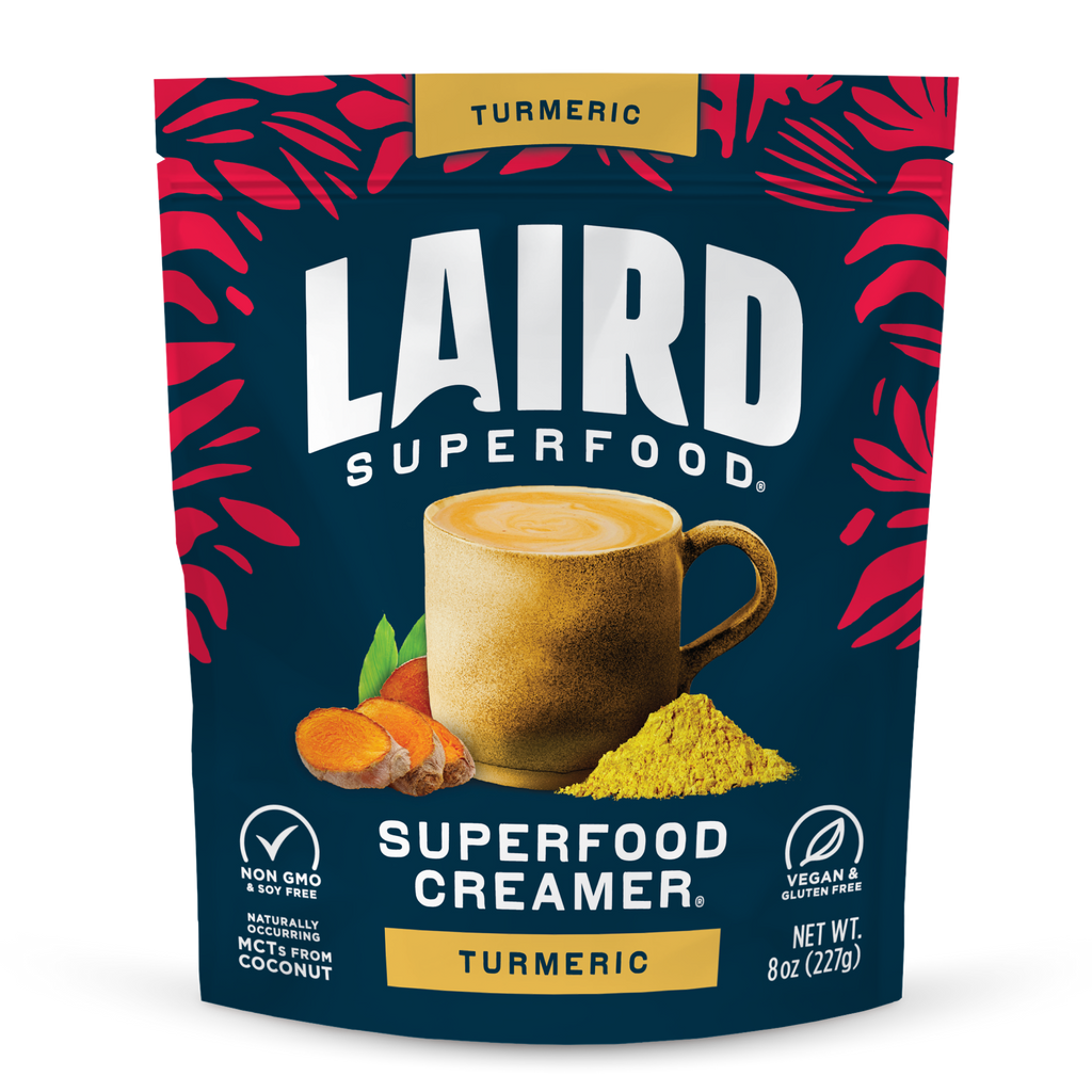 Laird Superfood Turmeric Creamer package with a cup and turmeric powder on a blue background