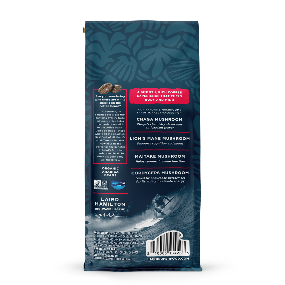 Back view of whole bean coffee bag with blue leafy pattern, highlighting organic Arabica beans and mushroom blend benefits with aquamin.