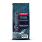 Back view of whole bean coffee bag with blue leafy pattern, highlighting organic Arabica beans and mushroom blend benefits with aquamin.