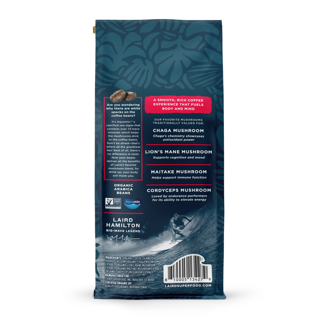 Back view of whole bean coffee bag with blue leafy pattern, highlighting organic Arabica beans and mushroom blend benefits with aquamin.