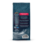 Back view of whole bean coffee bag with blue leafy pattern, highlighting organic Arabica beans and mushroom blend benefits with aquamin.