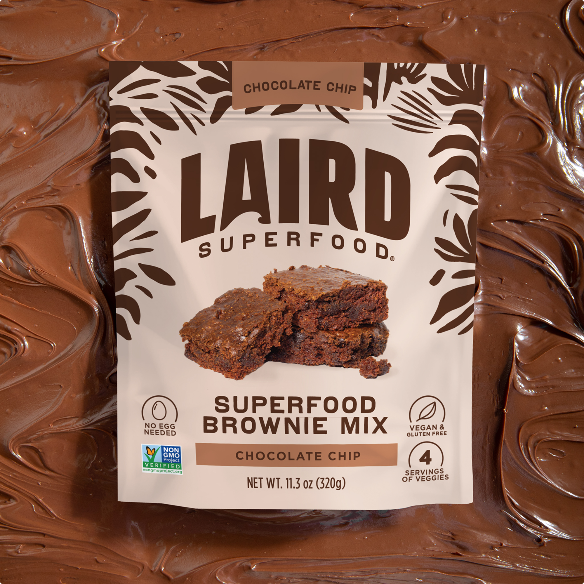 Laird Superfood brownie mix on top of brownie batter 