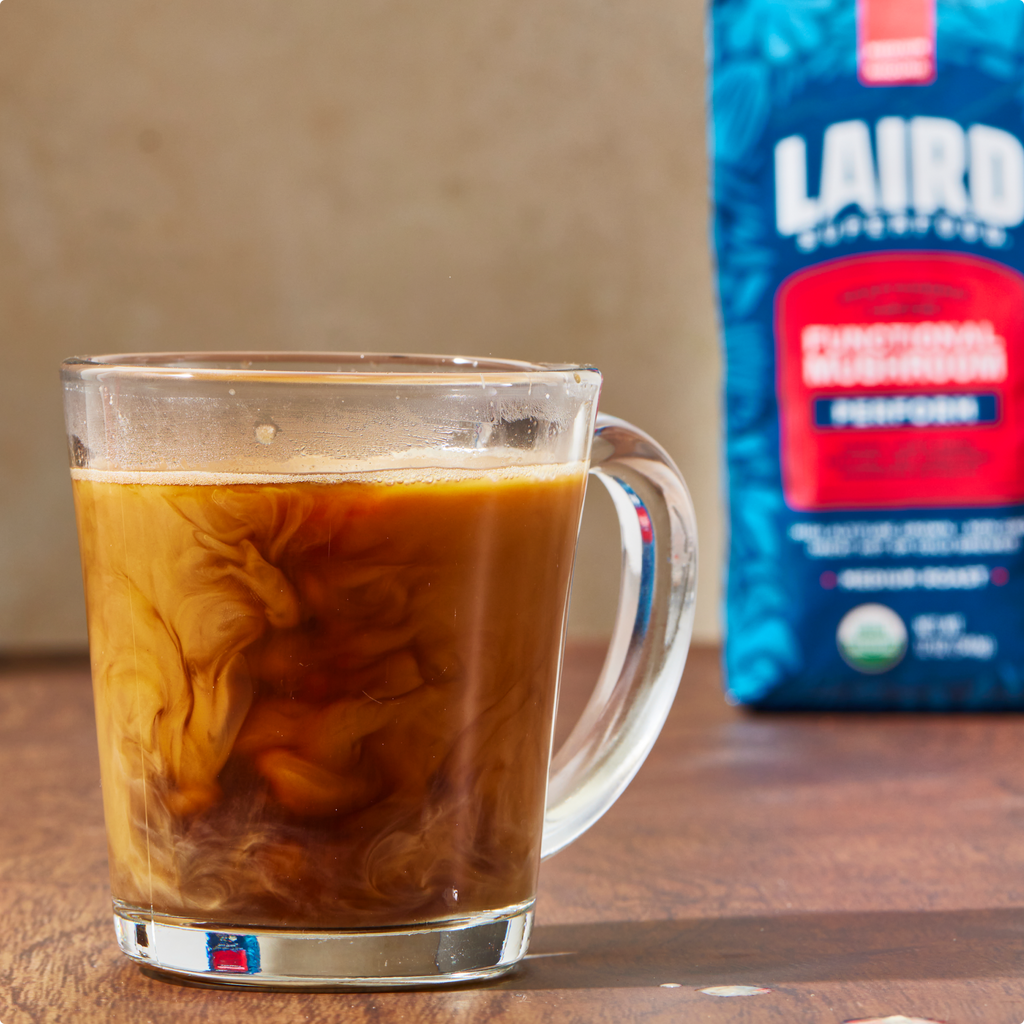 Glass mug filled with Laird Superfood coffee