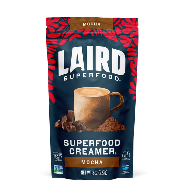 Front view of Laird Superfood Mocha Creamers with aquamin in a blue bag with red leafy highlight design.