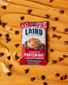 Peanut Butter Chocolate Chip Protein Bar in peanut butter and chocolate chips. 